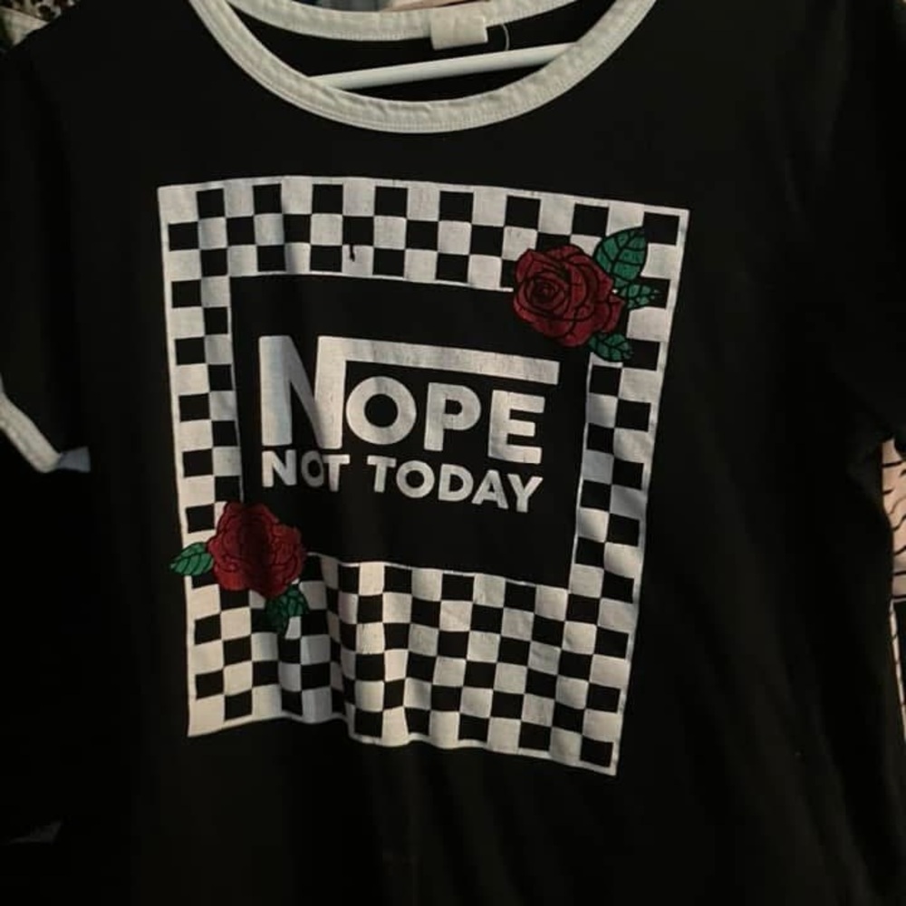 Graphic Tee with Checkered Pattern and Floral Design